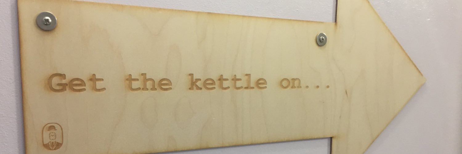 sign with writing 'get the kettle on'