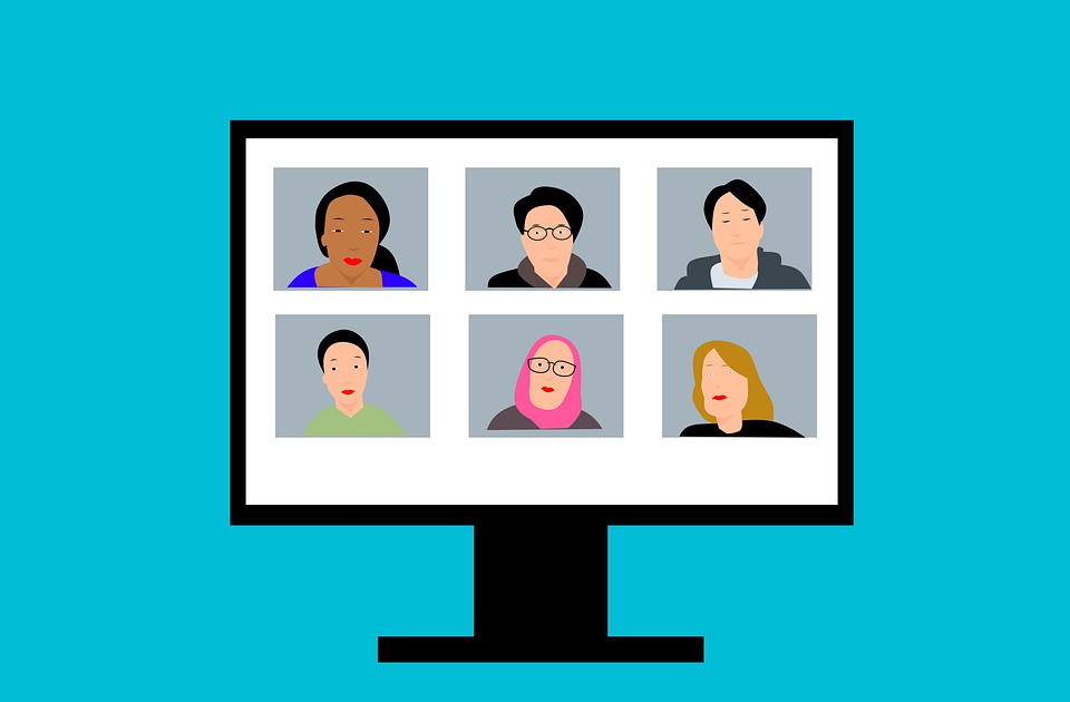 computer screen with different faces on a video call